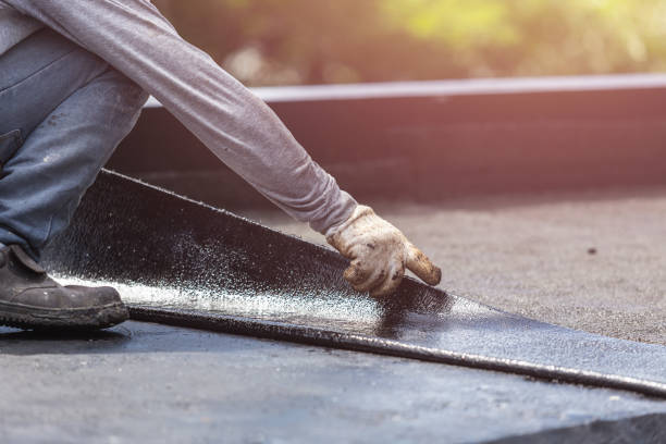 Professional Exterior Waterproofing technician working in Covert, MI